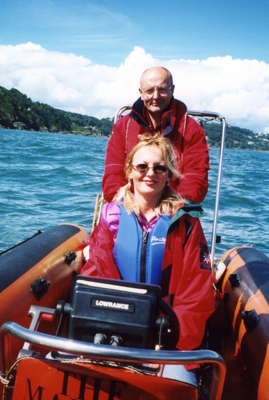 Andrew and Mady on a boat