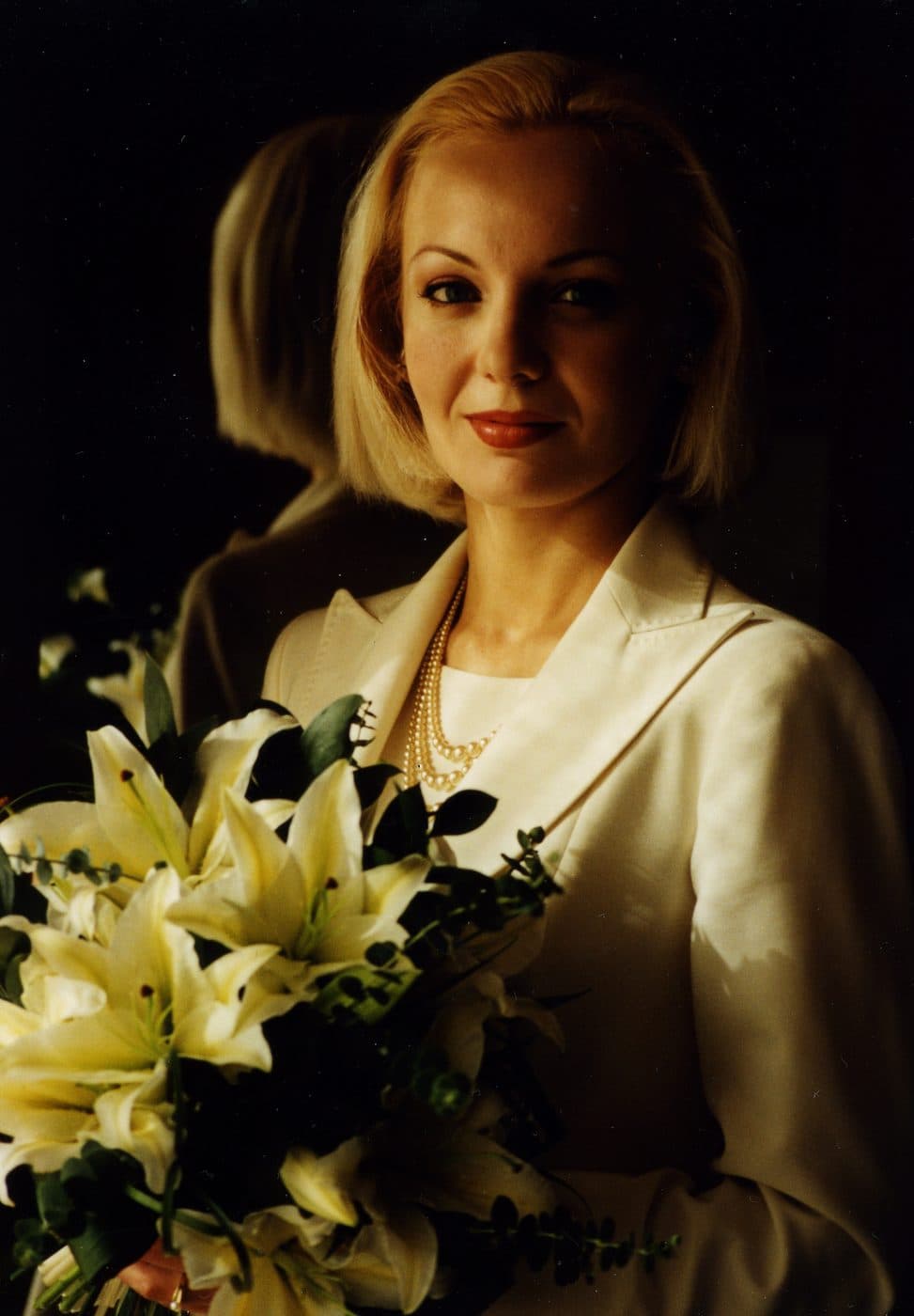 Mady holding lilies